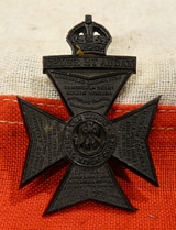 A Scarce WW2 British Kings Royal Rifle Corps Plastic Cap Badge