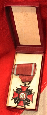 A Polish Republic Order Of Merit Medal with Miniature in Original Box