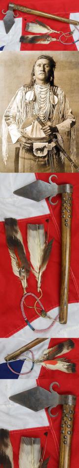 A Superbly Attractive, Native American Indian 'Spontoon Head' Style Tomahawk with Studded Haft, Glass Beads, and Eagle Feathers.