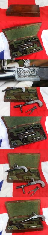 A Beautiful Pair of Cased 18th Century Flintlock Boxlock Pistols, By Sharp & Co With Barrel Turn-off Key and Ball Mould.