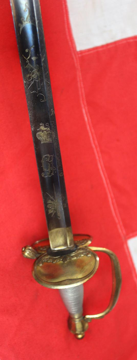 A Superb Quatre Bras and Waterloo 1796 Pattern Infantry Officers Sword Excellent Silver Bound and gold Hilt and Blue & Gilt Blade with Royal Cypher & Stands of Arms Engraving