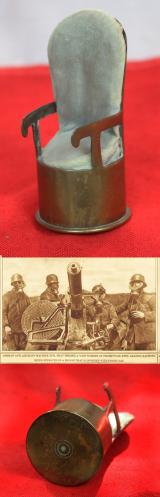 A Most Attractive and Scarce Piece of WW1 Trench Art, a Dolls House Chair Made From a Spent Shell Case, A One Pounder Maxim Pom Pom Shell