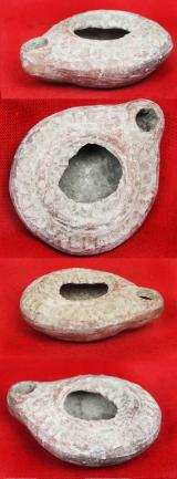Ancient Imperial Roman Discus Form Oil Lamp with Embossed Design Circa 100 AD