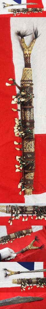 A Dyak Of Borneo, Tribesman's Mandau. A Tribal Head Hunter's Sword, From Kalimantan Island