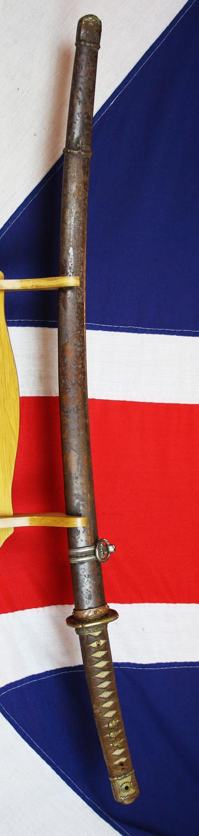 An Ancestral WW2 Japanese Officer’s Sword, in Traditional Type 98 Japanese Officer's Gunto Military Mounts. Stunning Hamon Shinto Blade Circa 1680 Signed Shimosaka