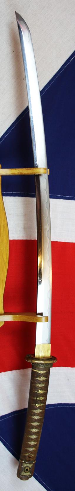 An Ancestral WW2 Japanese Officer’s Sword, in Traditional Type 98 Japanese Officer's Gunto Military Mounts. Stunning Hamon Shinto Blade Circa 1680 Signed Shimosaka