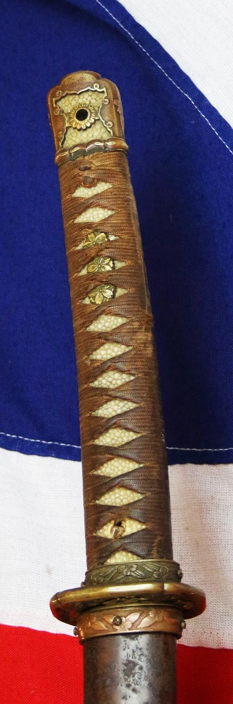 An Ancestral WW2 Japanese Officer’s Sword, in Traditional Type 98 Japanese Officer's Gunto Military Mounts. Stunning Hamon Shinto Blade Circa 1680 Signed Shimosaka