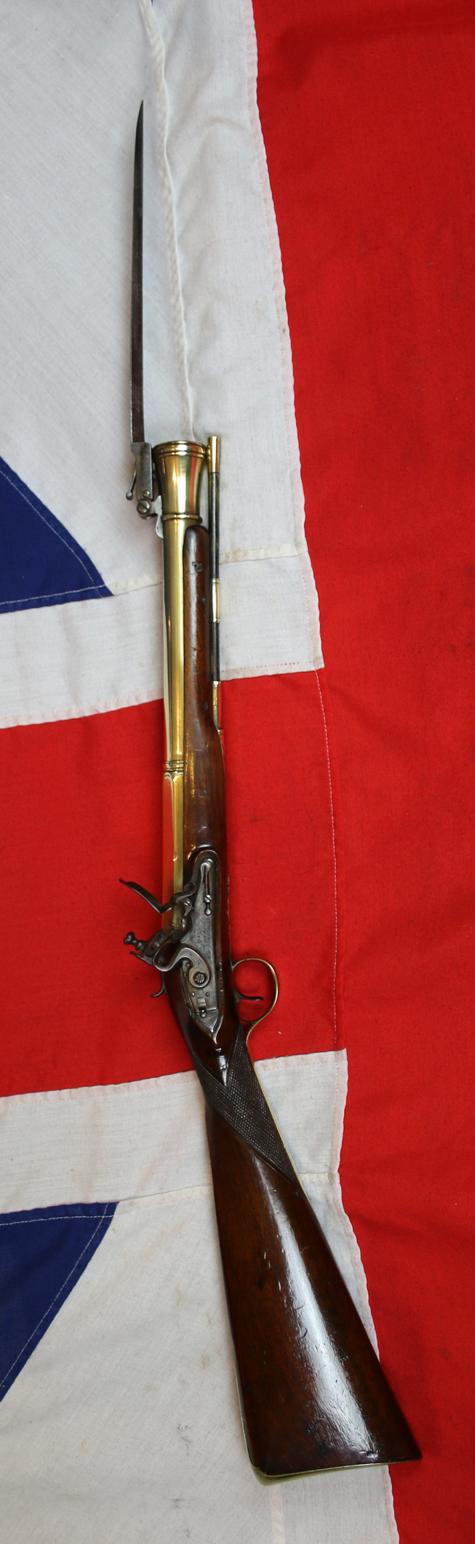 A Rare and Absolutely Spectacular, J. & W. Richards, All-Brass Flintlock Blunderbuss With Sprung Top Mounted Bayonet. Finest 'Juglans Regia' Walnut Stock. Circa 1800. Much Favoured by Ship's Captains