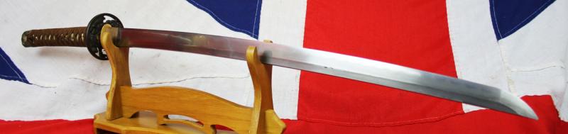 A Fine Shinto Period Handachi Mounted Armour & Kabuto Cleaving Katana Signed Nobutsugu, With a Fabulous Notare Hamon, Handachi Mounted with Tsuba Of Watanabe no Tsuna and The Rashomon Demon, Ibaraki-Dōji, At The Gate of the Modoribashi Bridge