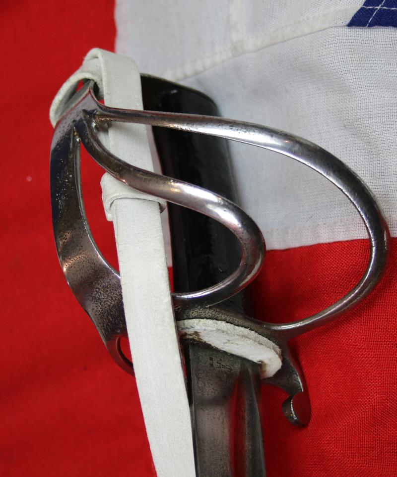 Superb Crimean War 1853 Issue British Cavalry Sabre, Exactly as Used by The Charge of the Light Brigade, and, The {Less Well Known, Yet Ironically More Successful} Charge of the Heavy Brigade. In Its Stunning Steel Scabbard, With White Buff Hide Knot