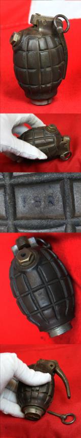 An Original, Inert, WW2 Service Issue British 'Mills Bomb' Grenade. Maker Stamped, I.B.R. by The Maker IBR {Ideal Boilers and Radiators} Ltd. Fitted With Automata Action