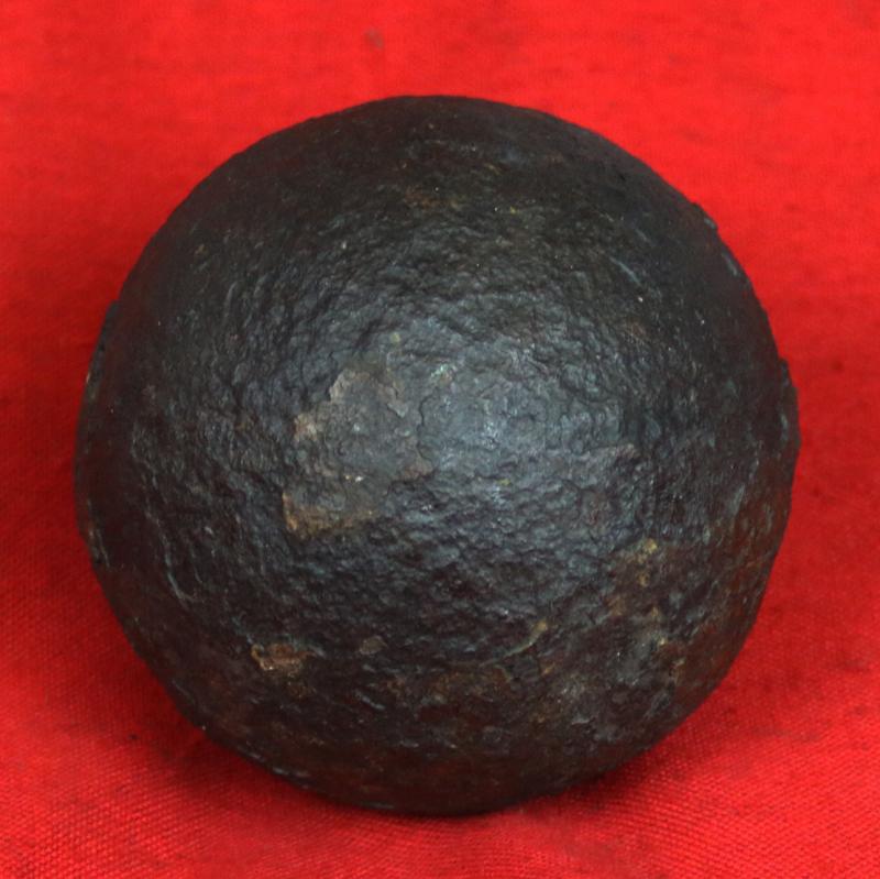 A Superb Original Waterloo Recovered Souvenir '6 Pounder ' Royal Artillery Cannon Ball Fired at La Haye Sainte During The Battle, Recovered From The Farm. With Clear Impact Site To The Ball.