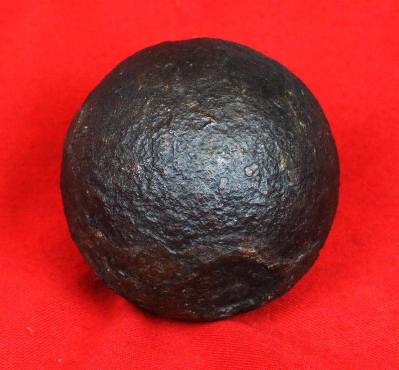A Superb Original Waterloo Recovered Souvenir '6 Pounder ' Royal Artillery Cannon Ball Fired at La Haye Sainte During The Battle, Recovered From The Farm. With Clear Impact Site To The Ball.