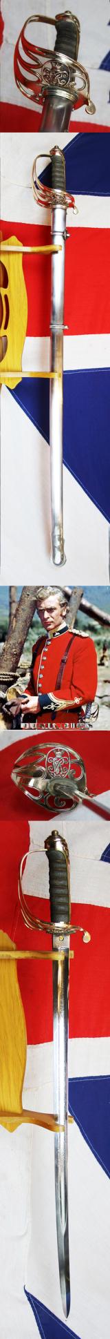 Superb Zulu War Period Original 1845 Pattern Victorian Wilkinson Infantry Officer’s Deluxe Grade Sword. Traditional Gothic Style VR Cypher Pierced Half Basket Hilt With Queen Victoria’s Cypher. Exactly As Worn By Lt Bromhead Made by Contractor Robert Mole