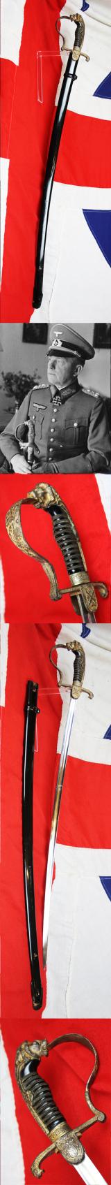 A Good Imperial German Artillery Officer's Sabre With Deluxe Lion Head Pommel Hilt, Lioness Quillon End and Embossed Oak Leaf & Acorn Pattern Design Throughout With Crossed Cannon Quillon.