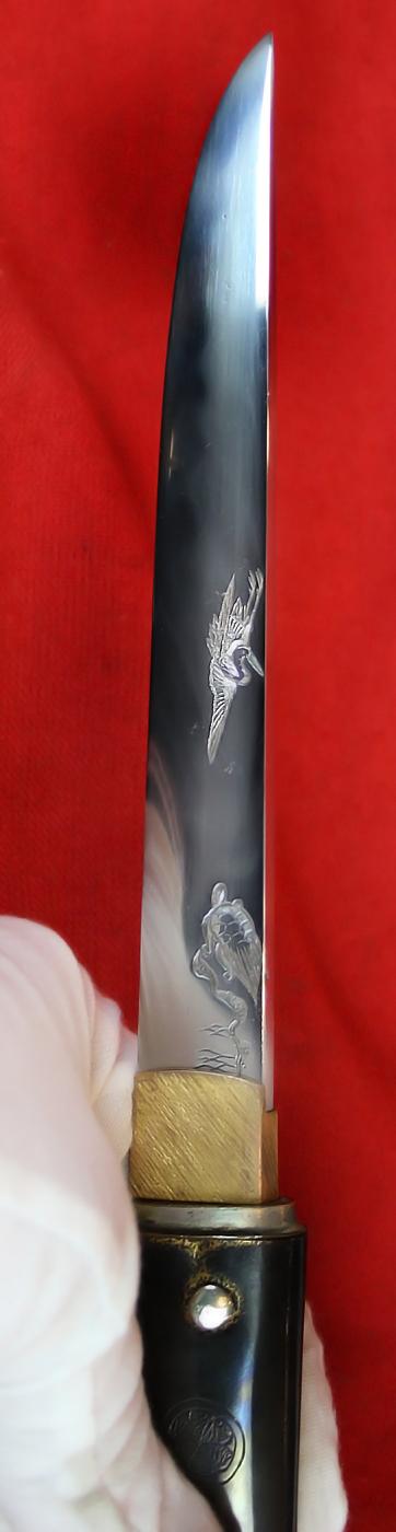 A Stunningly Beautiful, Signed,16th-17th Century Koto-Shinto Aikuchi Tanto, The Kunitsugu School, With Carved Horimono of a Crane and a Minogame Turtle,