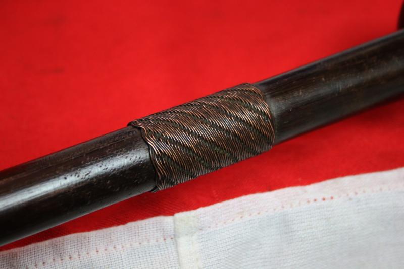 A Most Desirable Original Souvenir, A Collector's Item From The Zulu War of 1879, a War Club, Iwisa, Of A High Ranked Zulu 'isiKhulu', A Warrior's Long Knopkerrie, With a Telegraph Wire Geometric Wirework Bound Haft. In Fantastic Condition