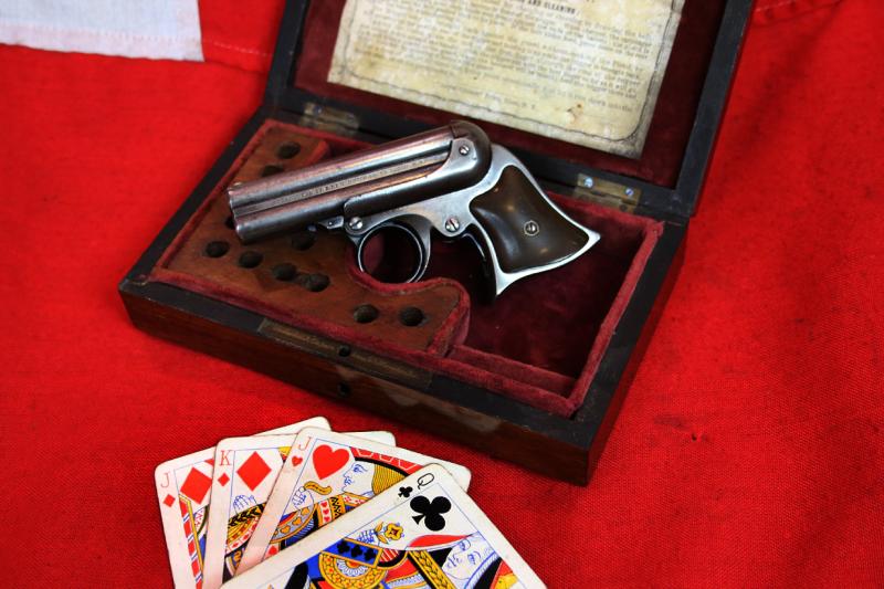 A Simply Superb. Antique, Wild West, Original .32 rimfire Remington Elliot 1860-61 patent, Cased Four-Barrelled Derringer Pistol. As Good If Not Better Than Any Seen In American Wild West Museums. Cased by T Underhill of Manchester