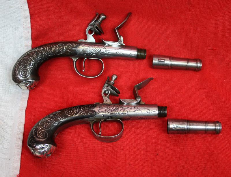 Absolutely Beautiful & Captivating Pair Of American Revolution Period 18th Century 'Queen Anne' Cannon Barrel Pistols with Silver Inlays & Solid Silver Grotesque Mask Butt Caps. Near Identical To Another Recovered From a Shipwreck off The Florida Coast
