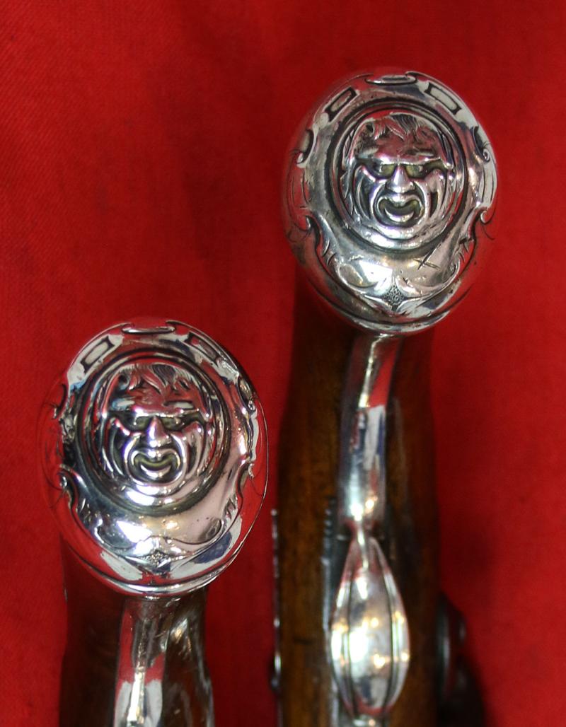 A Magnificent Pair of 18th Century London, Silver Mounted Long Holster Pistols Circa 1720, By George Halfhide of The Minories London. Elected Master of the London Gunmakers Company in 1736