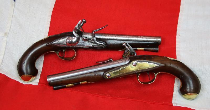 A Very Fine Pair of 1770's Gentleman' or Officers Holster Pistols. Fine Juglans Regia Walnut Stocks, All Brass Cast Furniture Mounts Beautifully Engraved. Bright Steel Barrels & Flintlocks Signed Waters & Ward