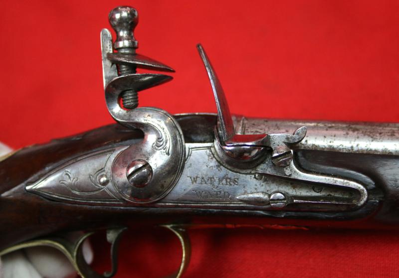 A Very Fine Pair of 1770's Gentleman' or Officers Holster Pistols. Fine Juglans Regia Walnut Stocks, All Brass Cast Furniture Mounts Beautifully Engraved. Bright Steel Barrels & Flintlocks Signed Waters & Ward