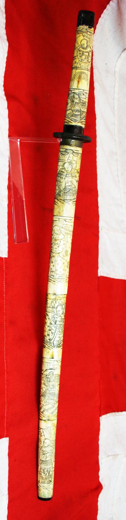 A Late 19th Century Most Attractive Hand Carved Japanese Samurai Style Export Sword From the Late Edo to Taisho Period. Decorated Throughout With Takebori Carved Figures of Armoured Samurai & Nobles In Court Dress