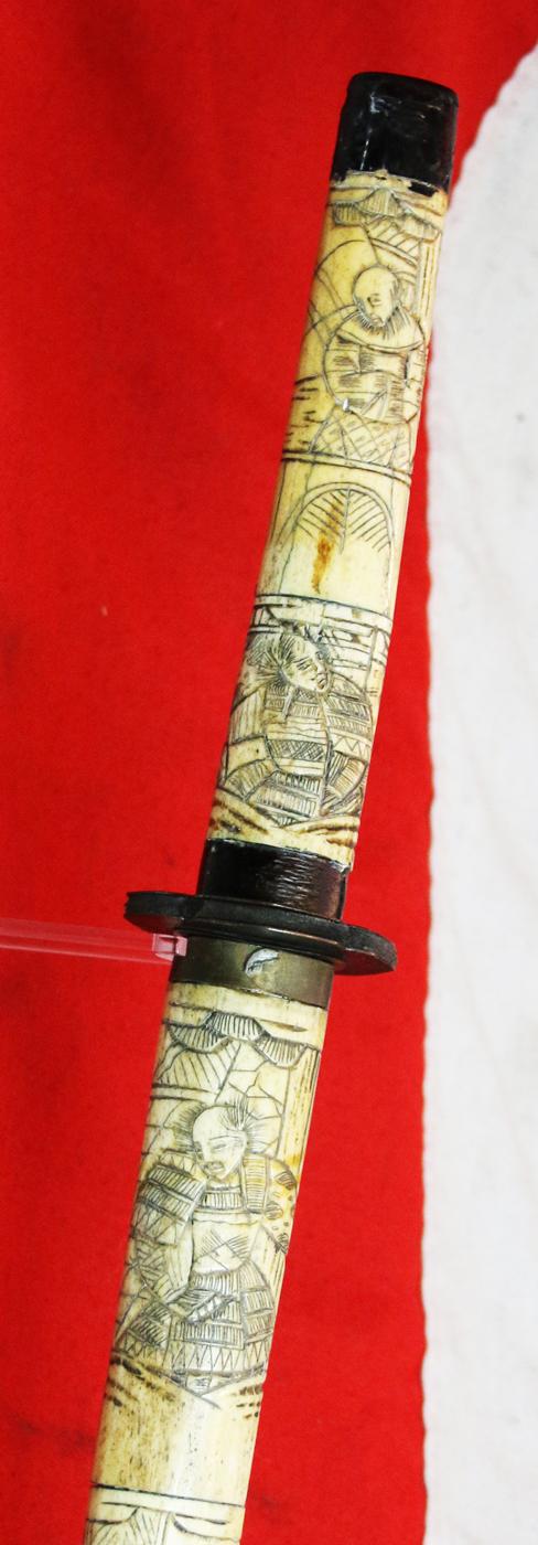 A Late 19th Century Most Attractive Hand Carved Japanese Samurai Style Export Sword From the Late Edo to Taisho Period. Decorated Throughout With Takebori Carved Figures of Armoured Samurai & Nobles In Court Dress