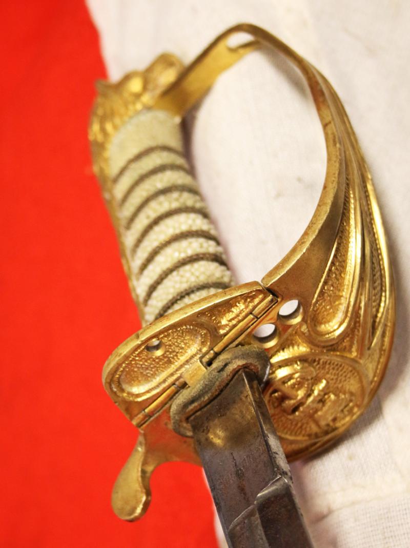 A Very Attractive, Original, British, Regulation Royal Naval Officers Sword, Post 1953 Pattern, Used in The Falklands War The South Atlantic Campaign. Made By Gieves Of Saville Row, London
